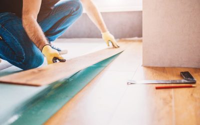 Man-at-home-laying-laminate-flooring