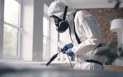 Trauma Cleaning Services | Water Damage Restoration in NC | Restoration Carolina Inc specialist-in-white-special-uniform-and-mask-in-the-apartments